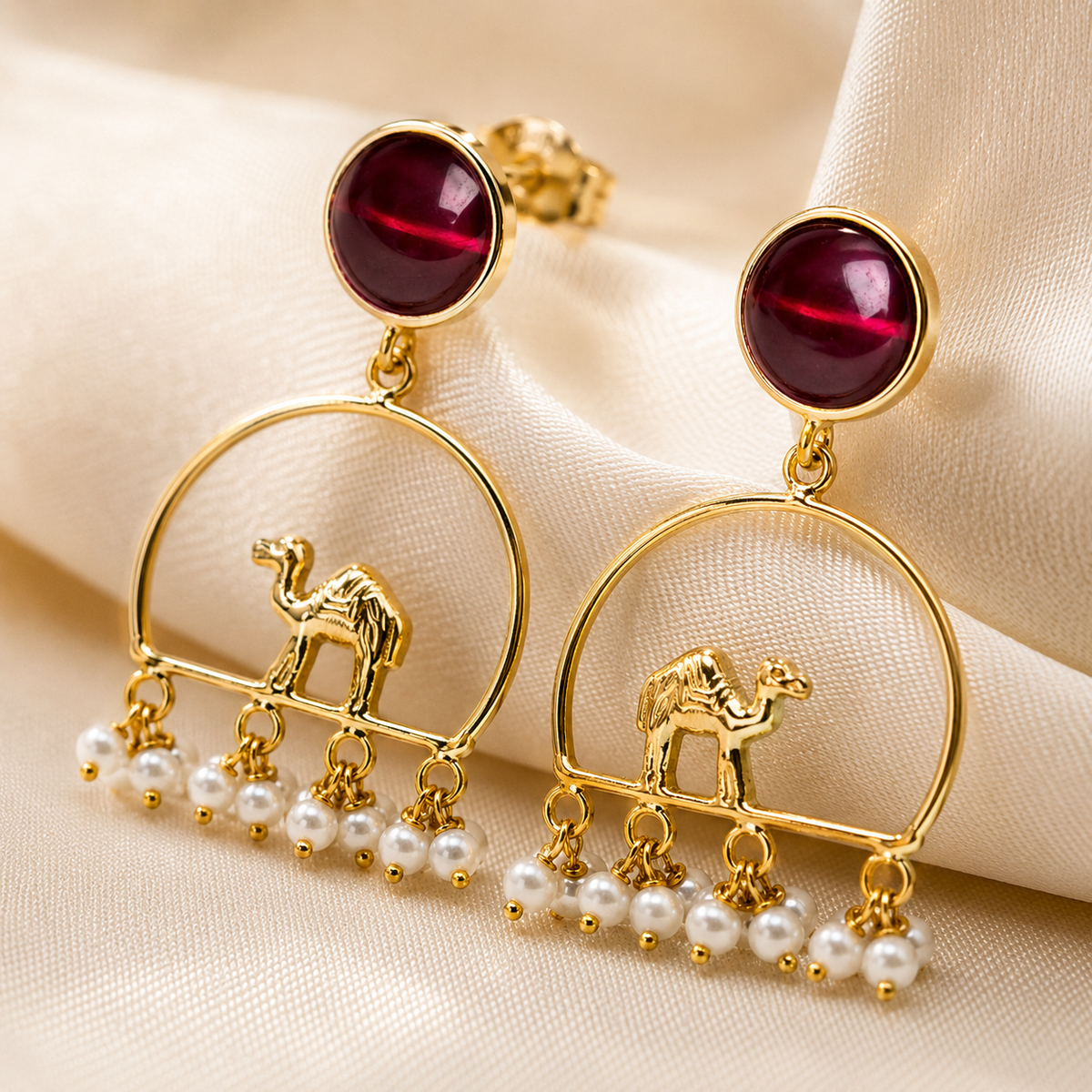 Gold-Plated Camel Chandbali Earrings with Ruby Red Stone & Pearl Tassels