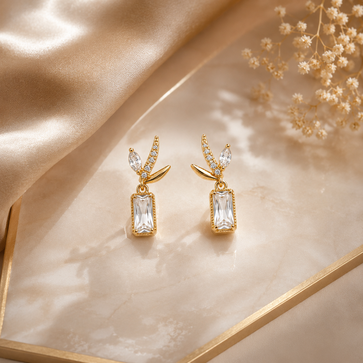 Gold-Plated Leaf Design Baguette Crystal Drop Earrings